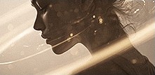 Profile of a woman encircled by orbits of light