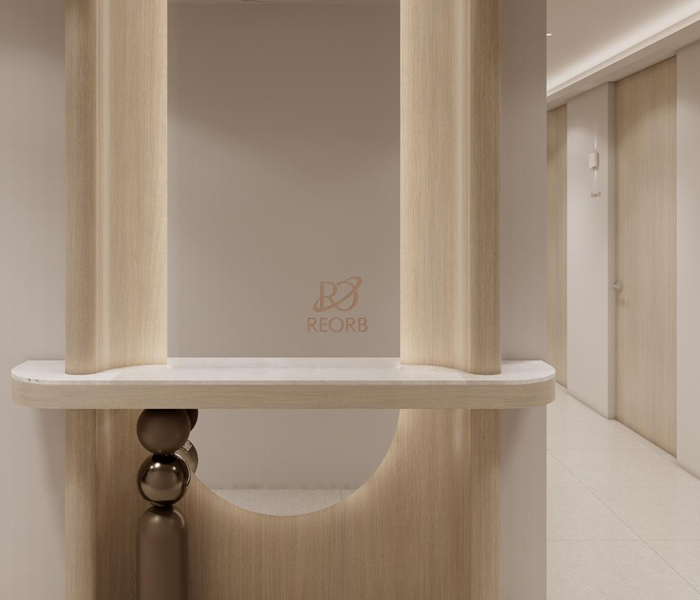 Reception desk and hallway at the REORB Dermatology entrance