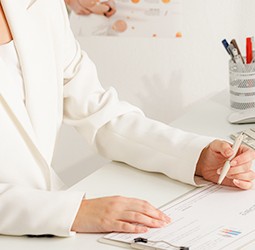 Medical staff taking notes during a consultation